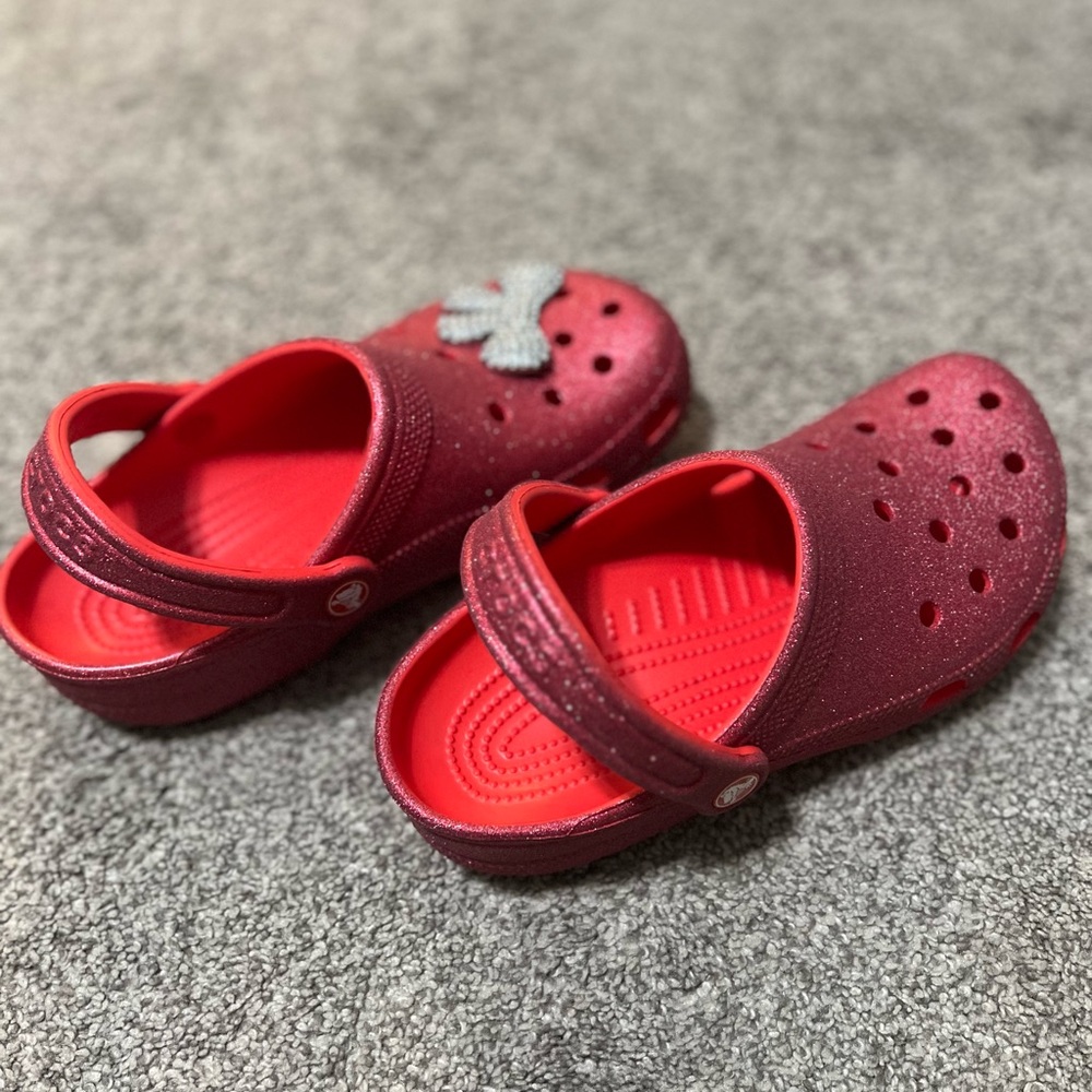 CROCS Girls' Glitter Red Slip-On Sandals with Silver Bow Accent